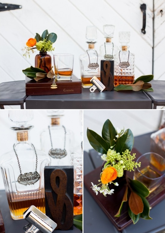 Bourbon decanters and floral decor create an elegant display