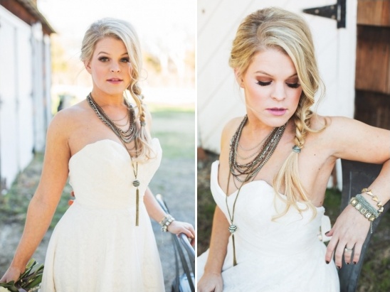 Blonde bride in white dress with layered necklace