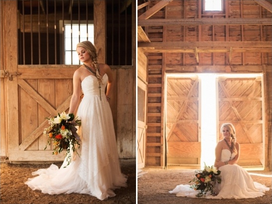 Bride with bouquet in white dress barn setting