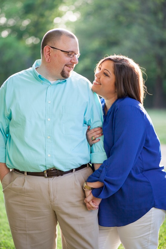 Happy couple gazes at each other outdoors