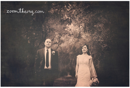Sepia toned wedding photo of a bride and groom outdoors