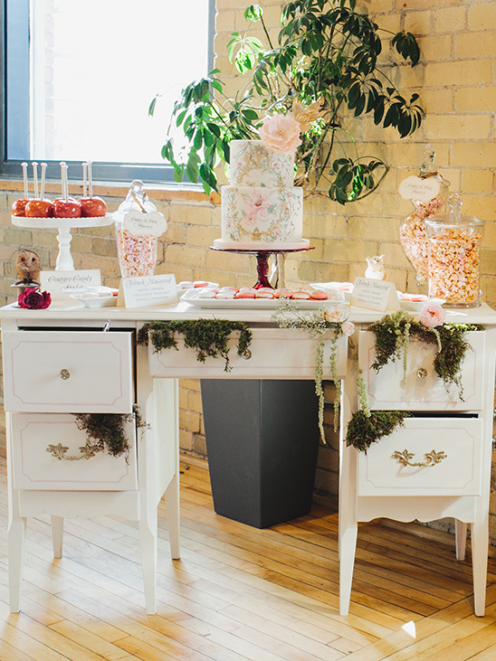 Elegant wedding dessert table with cake and candy buffet