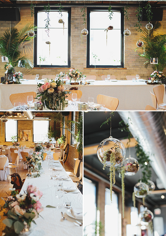 bridal party table with hanging flower filled glass ornaments