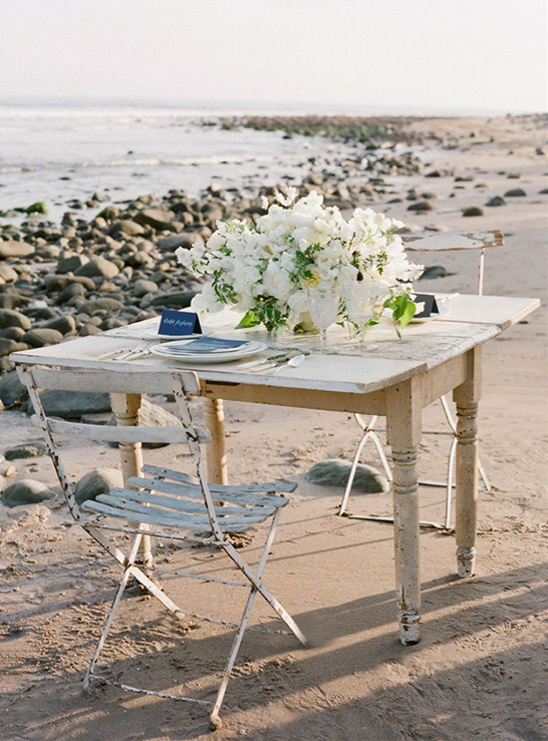 sweetheart table at beach wedding