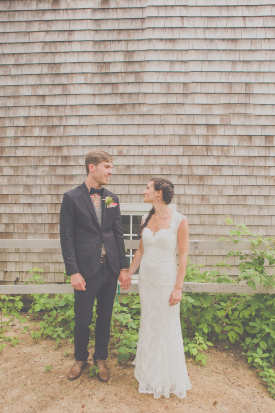 Happy couple holding hands on their wedding day portrait