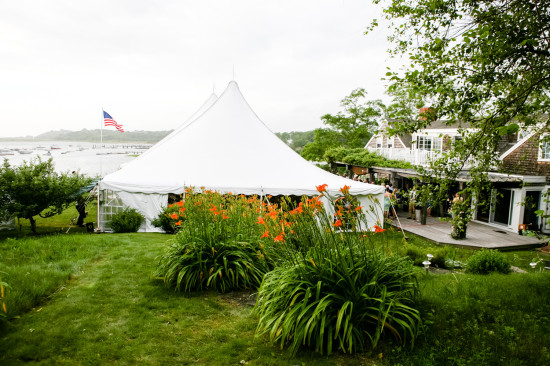 Elegant outdoor wedding tent with American flag on the coast