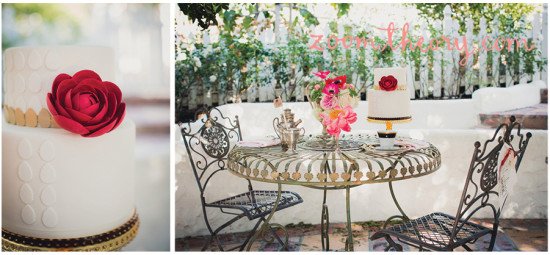 Wedding cake with a red rose next to a vintage garden setting