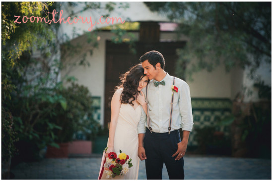 Couple in love on their wedding day, bride leaning on groom