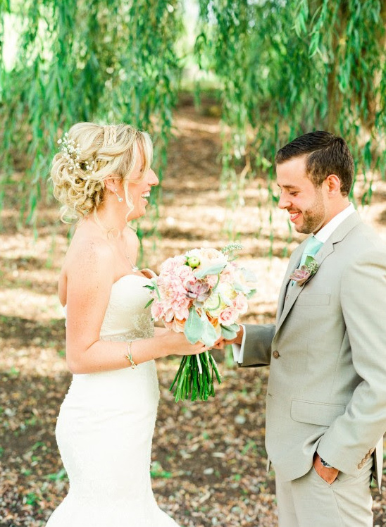Bride and groom sharing a joyful moment on wedding day
