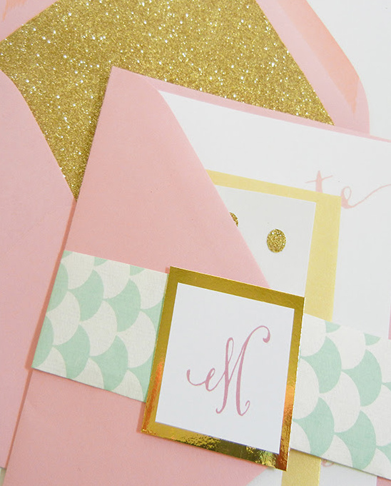 Pink and gold stationary with the letter M design