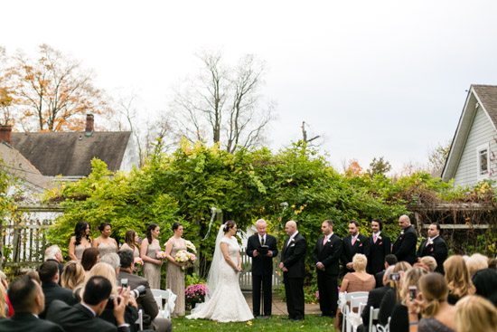 Outdoor wedding ceremony with bride and groom exchanging vows