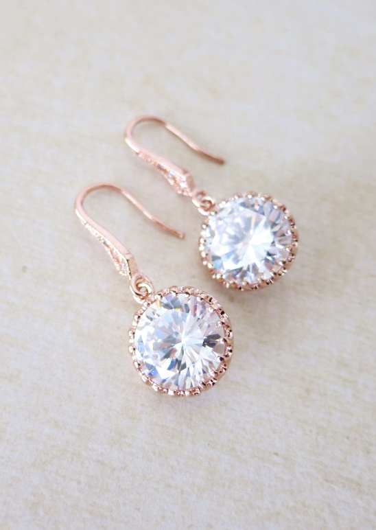 Rose gold earrings with a sparkling cubic zirconia setting
