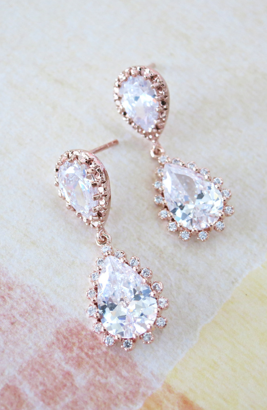 Elegant rose gold teardrop earrings with sparkling clear gems