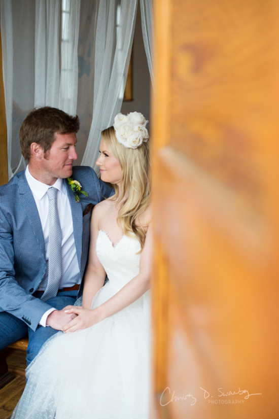 Newlyweds gazing lovingly at each other on their wedding day