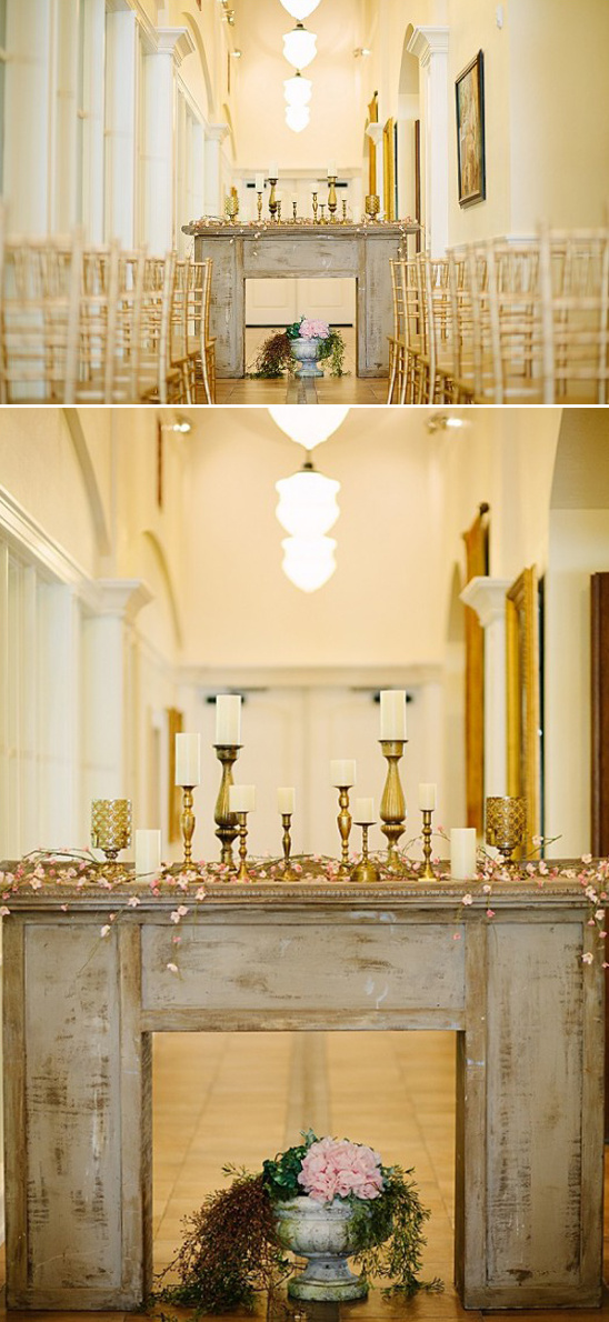 Elegant wedding ceremony setting with fireplace and decor