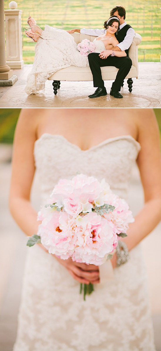 Romantic wedding couple relaxing on a couch with a bouquet of flowers