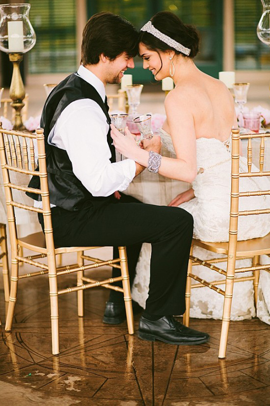 Bride and groom share a tender moment at their wedding