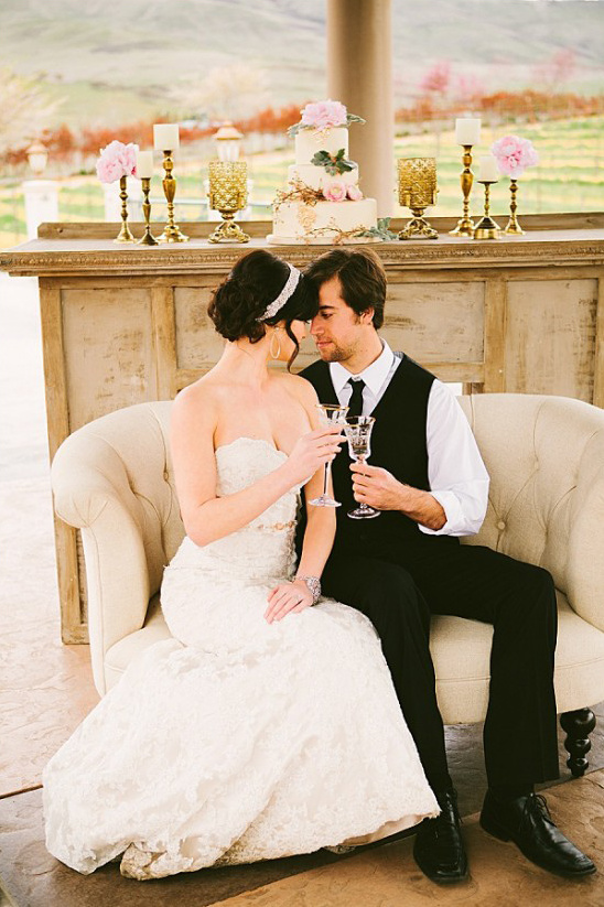 Bride and groom toasting at their elegant wedding