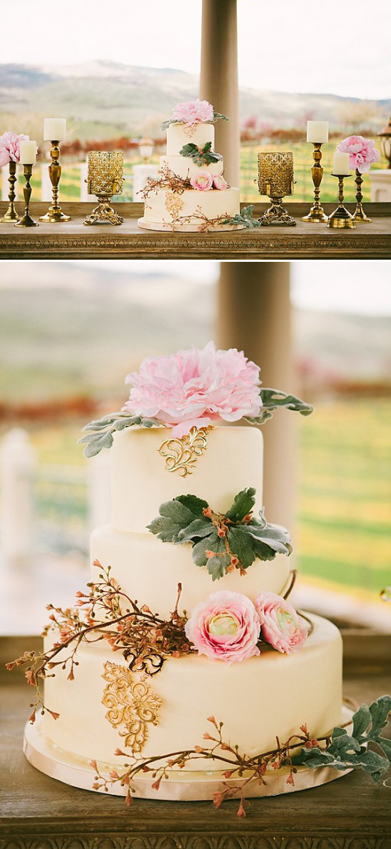 Elegant three tier wedding cake with pink flowers