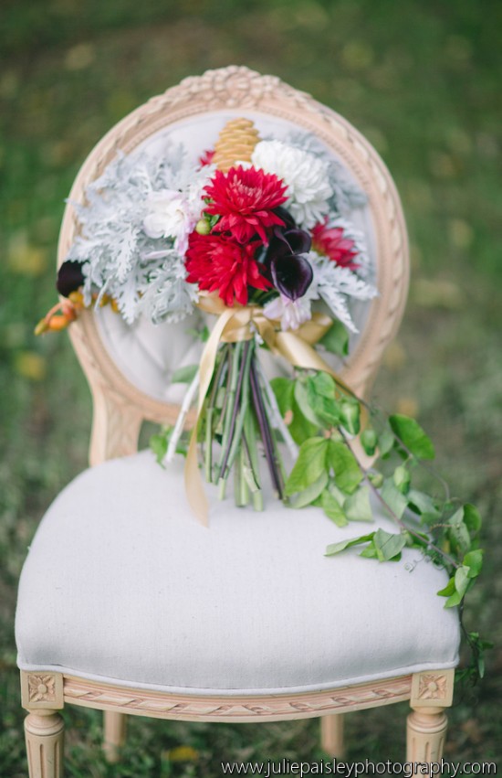 Elegant floral bouquet on antique chair, wedding decor idea