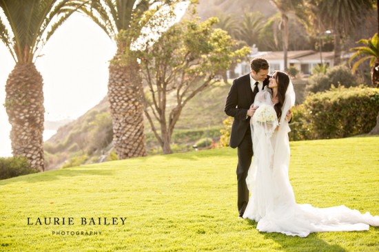 Beautiful wedding couple on a sunny lawn