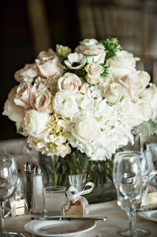 Elegant white flower centerpiece on a wedding table setting