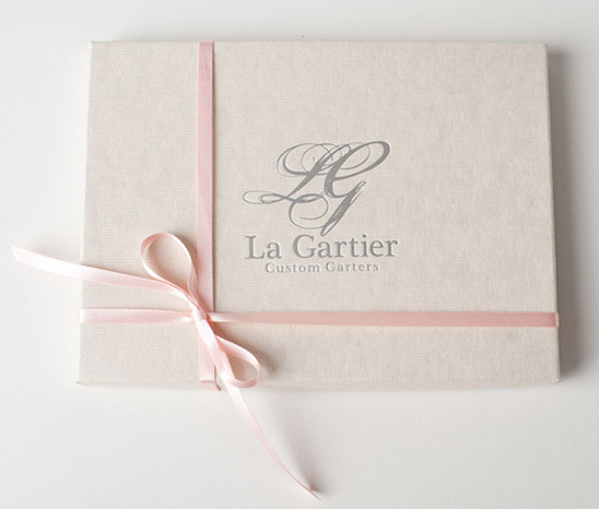 Elegant La Gartier custom garter box tied pink ribbon