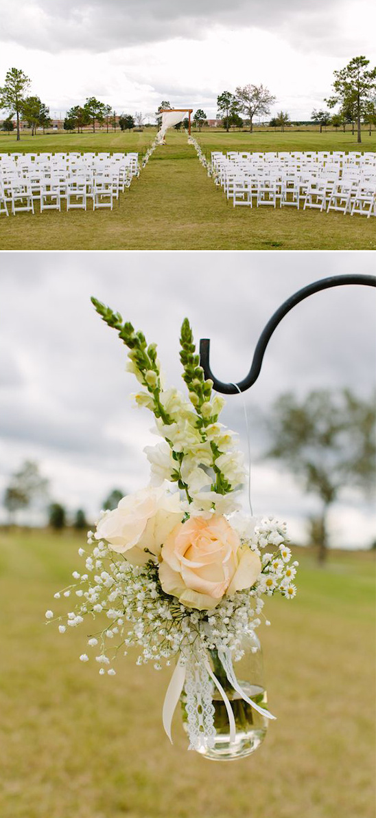 classic ceremony seating with hanging floral decor
