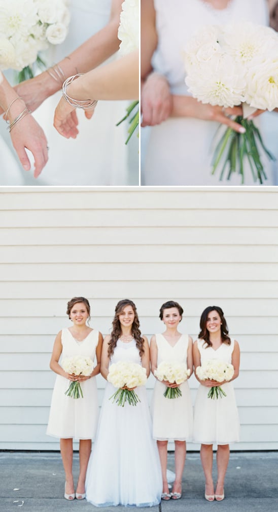 bridesmaids in white with silver bangels