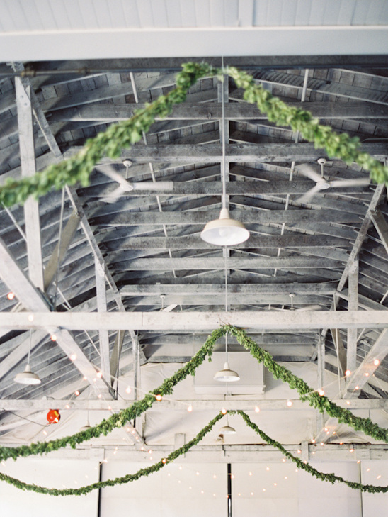 garlands and string lights to decorate a large industrial space
