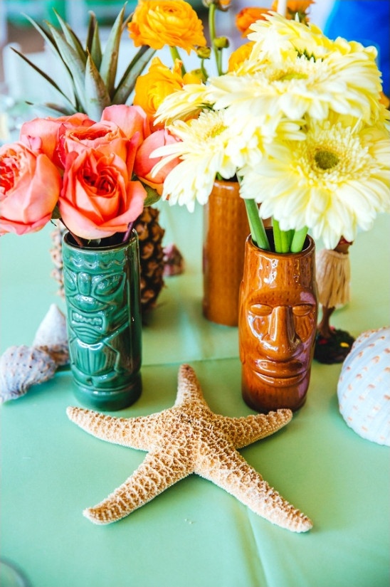 tiki head vases and ocean themed centerpieces