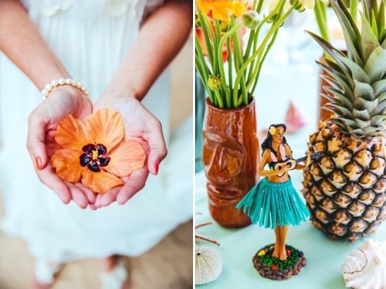 hula girl figurine and hawaiian flower