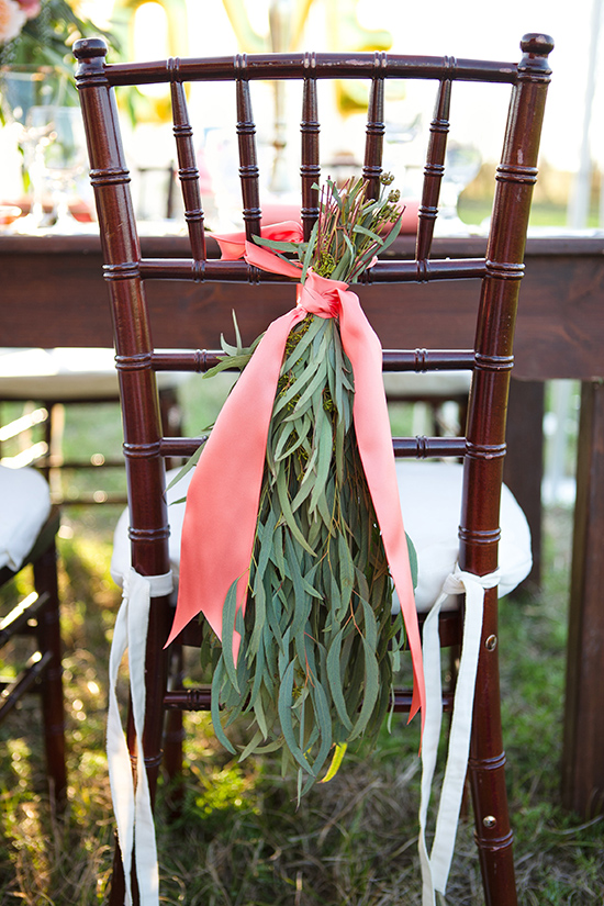 hanging greenery and ribbon chair decor