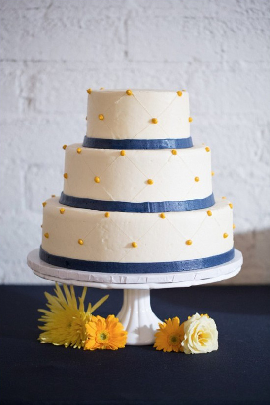 navy white and yellow wedding cake