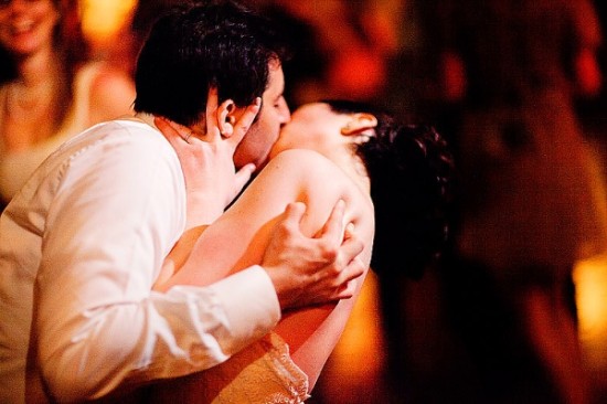 Romantic couple embracing and sharing a passionate kiss
