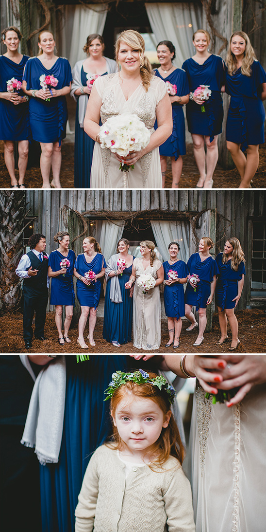 blue bridesmaids and cute red headed flower girl