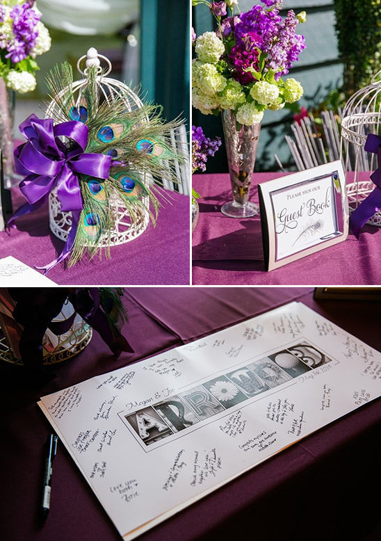 guestbook table decked out in purple and peacock feathers