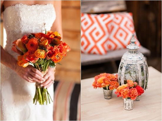 Bride holds vibrant orange bouquet wedding table flowers