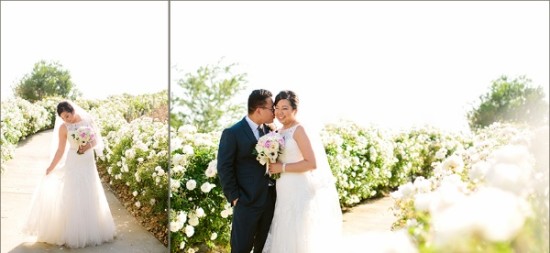Bride and groom kissing in flower garden