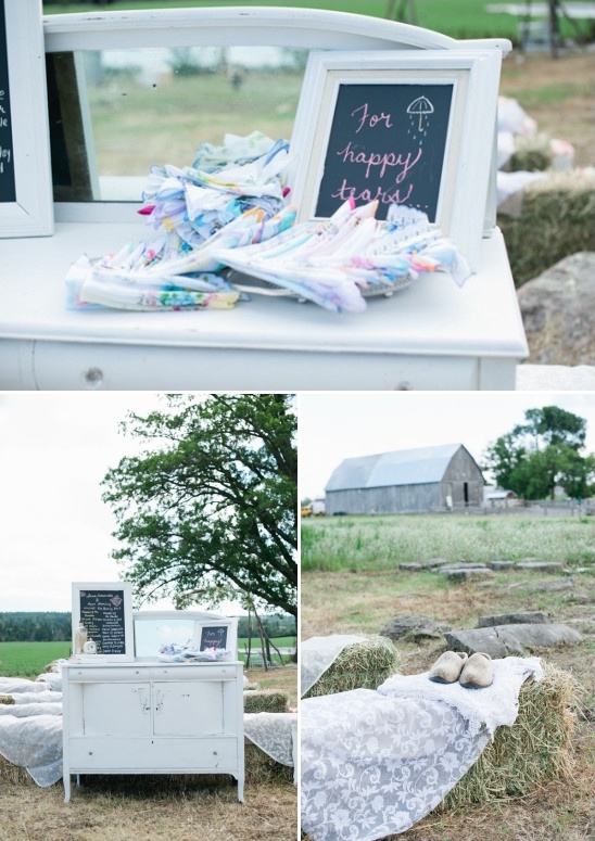 antique dresser turned welcome table and lace covered haybales for seating
