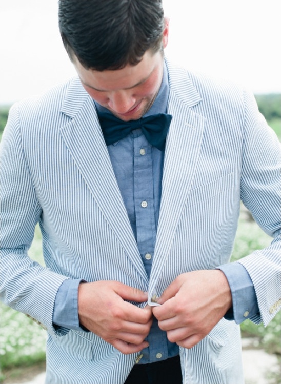 light blue pin stripped jacket denim shirt and bow tie groom