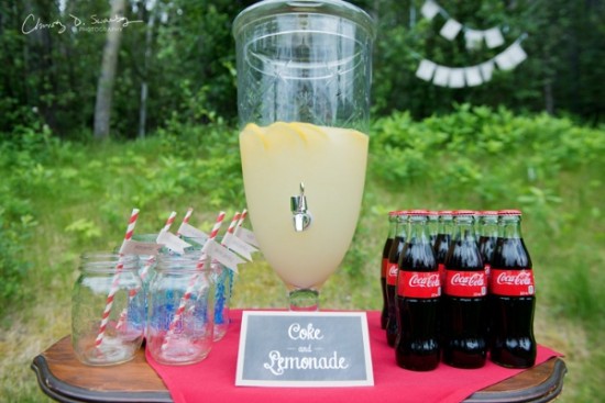 Outdoor drinks station with lemonade coke and mason jars