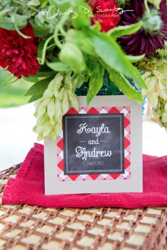 Kayla and Andrew wedding table setting with flowers