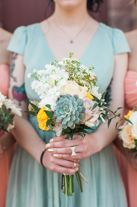yellow flowers and succulent bouquet