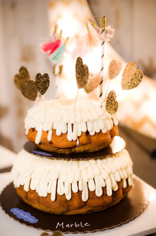 tiered bundt cake wedding cake with glitter heart toppers