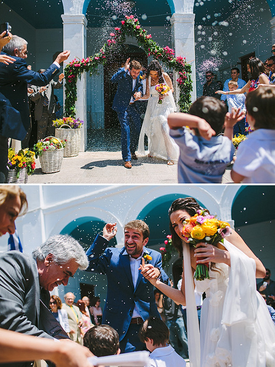 Newlyweds showered with confetti at their Greek wedding