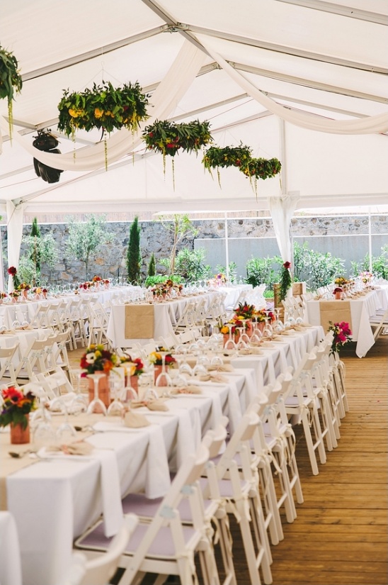 Elegant wedding reception with floral decorations tent
