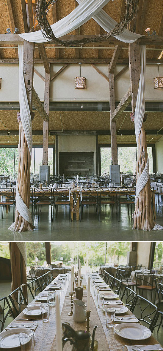 fabric drapped reception decor and family style seating