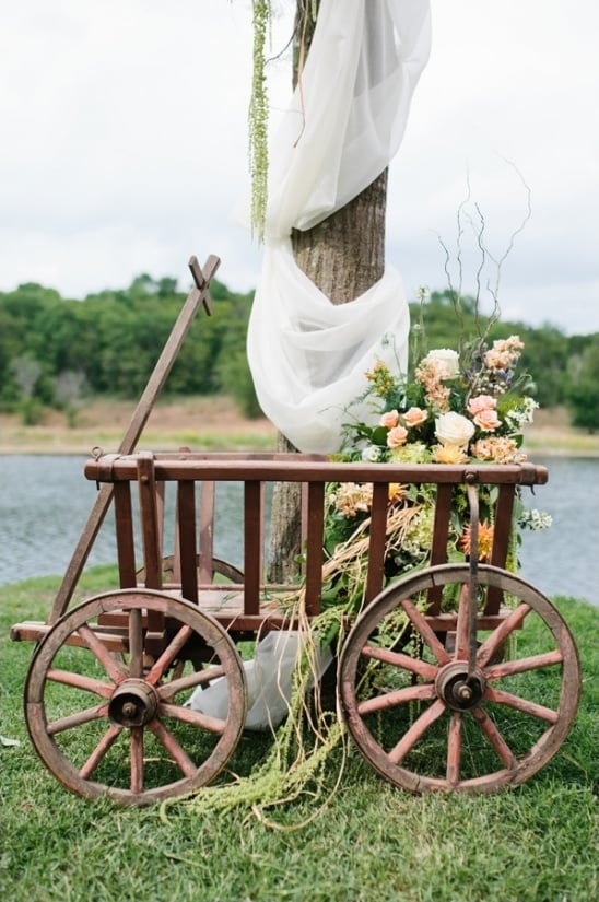 wooden wagon and floral arrangement