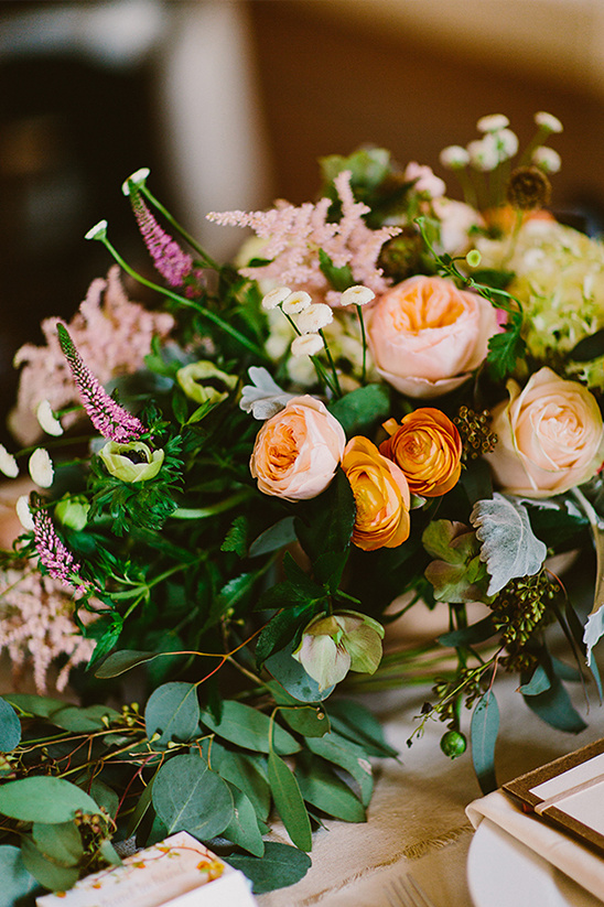 Elegant bouquet with peach roses and eucalyptus leaves